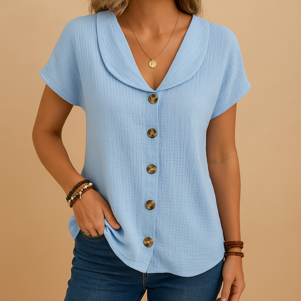 Women’s elegant button blouse with classic collar and soft breathable fabric — perfect for casual or semi-formal occasions.