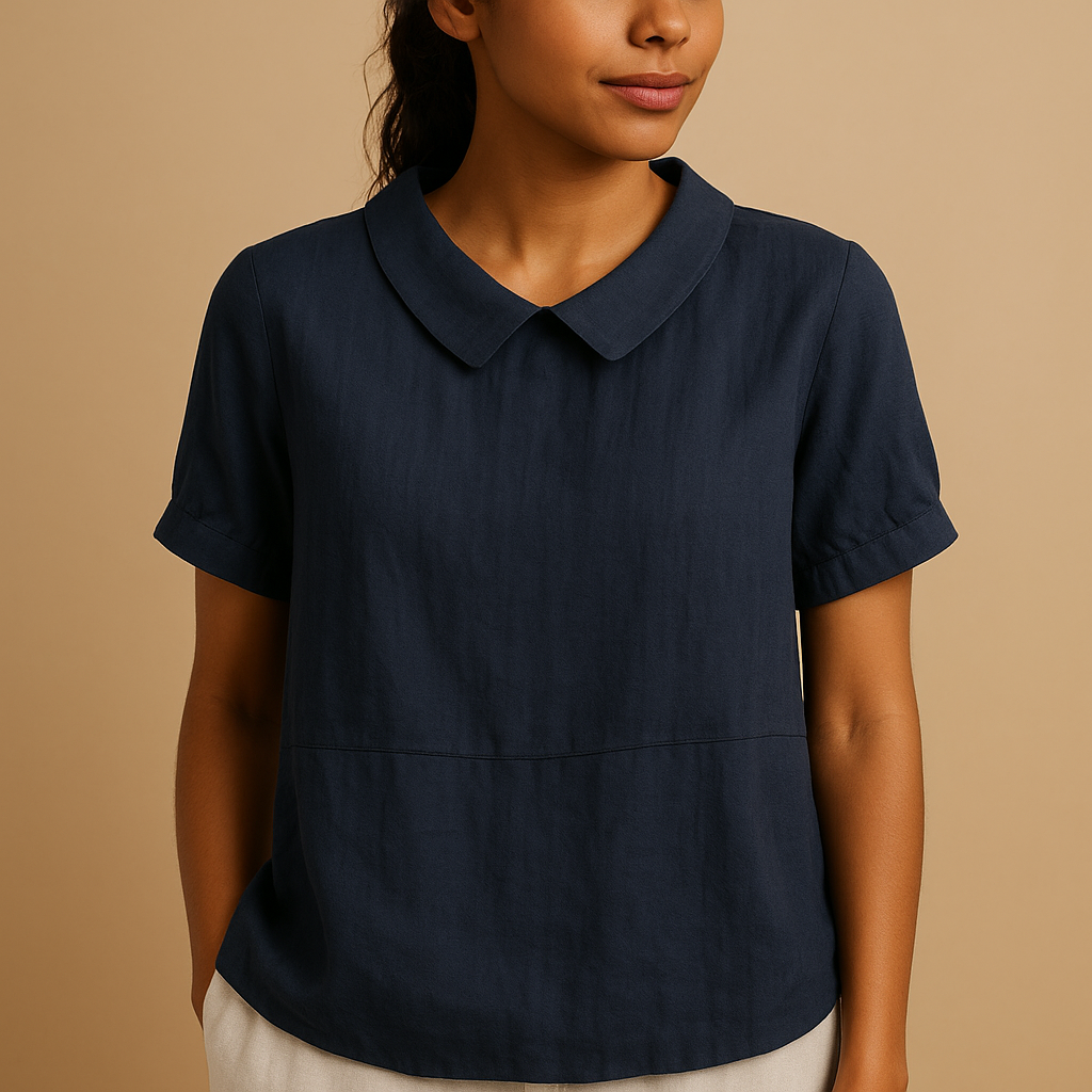 Women’s elegant fitted blouse with a classic design — perfect for office wear, formal meetings, and timeless smart-casual outfits.