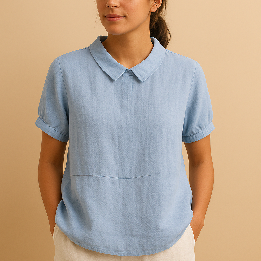 Women’s elegant fitted blouse with a classic design — perfect for office wear, formal meetings, and timeless smart-casual outfits.