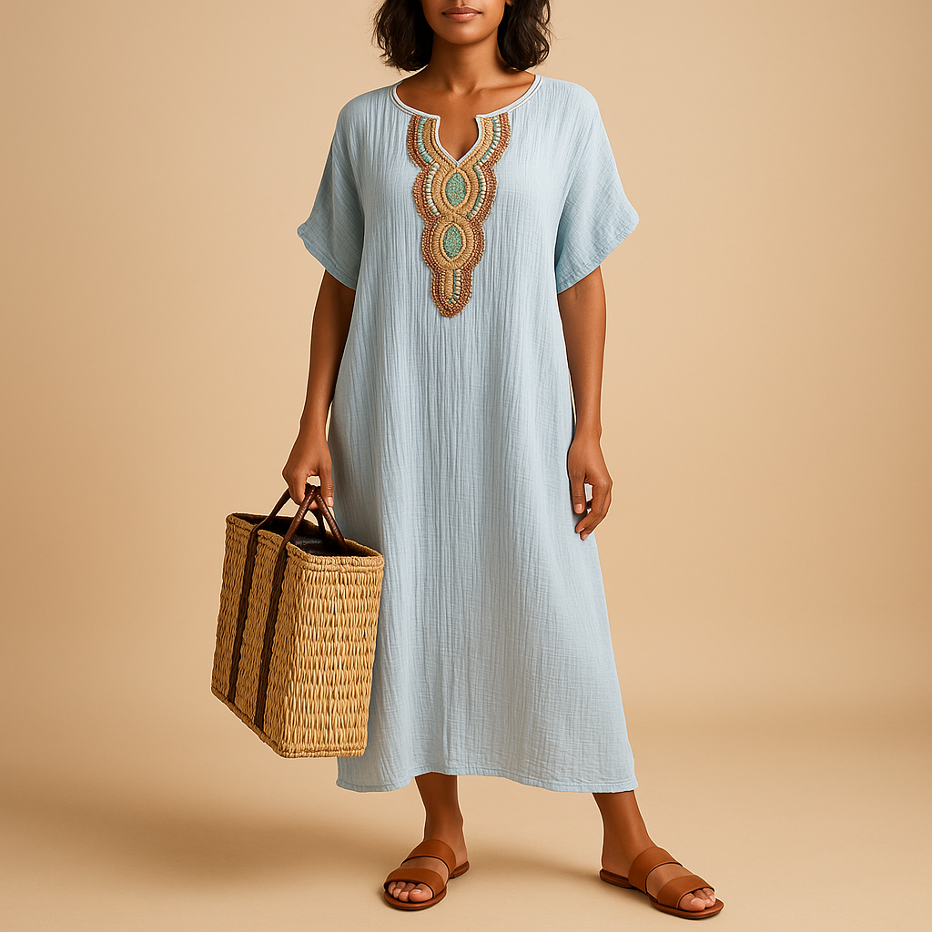 Flowy kaftan dress for women in lightweight fabric with a loose fit, ideal for summer days, beaches, and versatile styling.