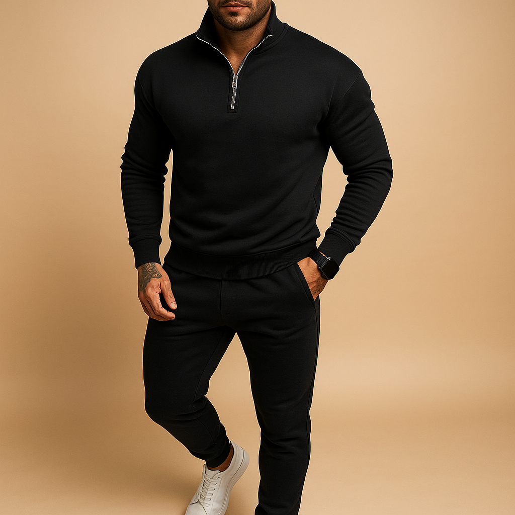 Modern men’s jogging set with half-zip sweatshirt and matching joggers. Comfortable fit, perfect for casual days, light sports, or relaxing at home.
