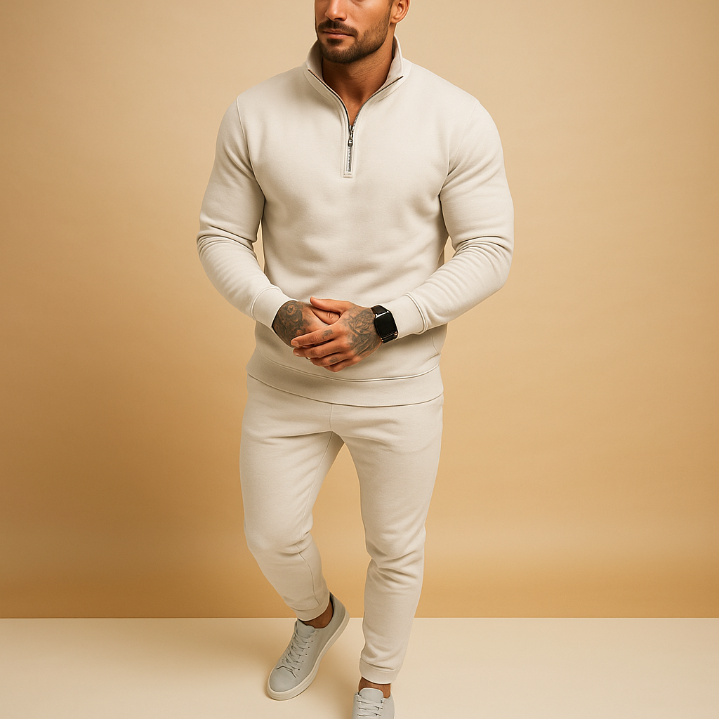 Modern men’s jogging set with half-zip sweatshirt and matching joggers. Comfortable fit, perfect for casual days, light sports, or relaxing at home.