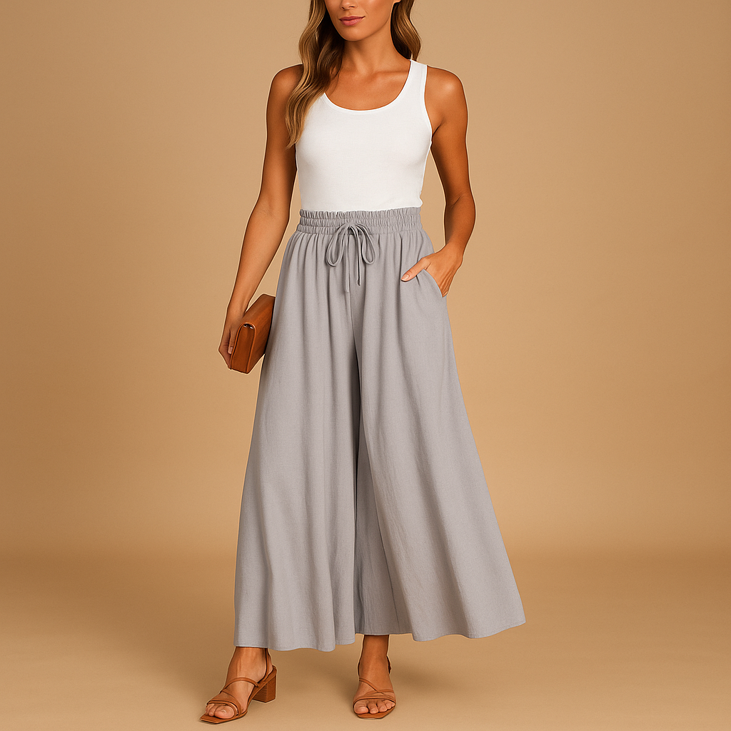 Women’s high-waist wide-leg pants with an elastic waistband, ideal for business, casual, or evening outfits.