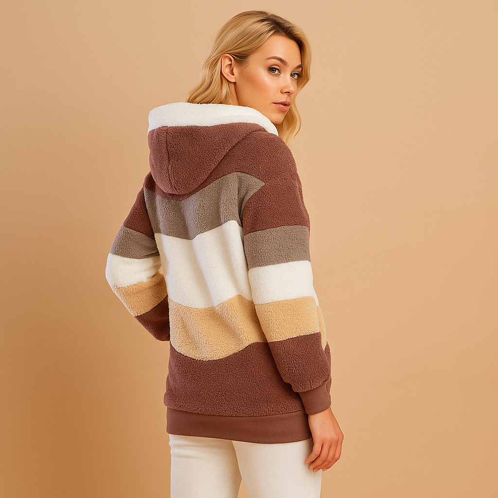 Long plush winter coat for women with soft fabric, relaxed fit, and refined silhouette, available in warm neutral tones for elegant winter outfits.