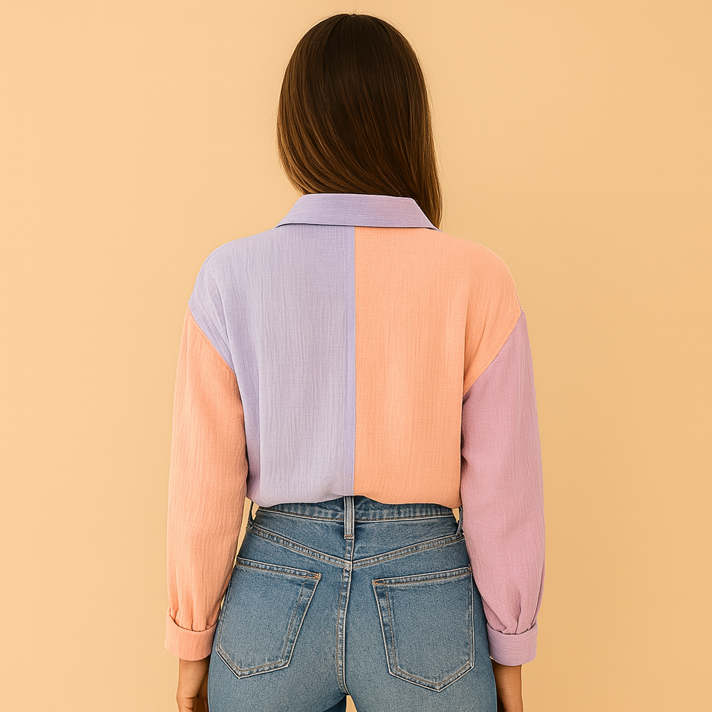 Colorful patchwork blouse for women with a relaxed fit in pink and light blue tones, perfect for casual and semi-formal outfits.