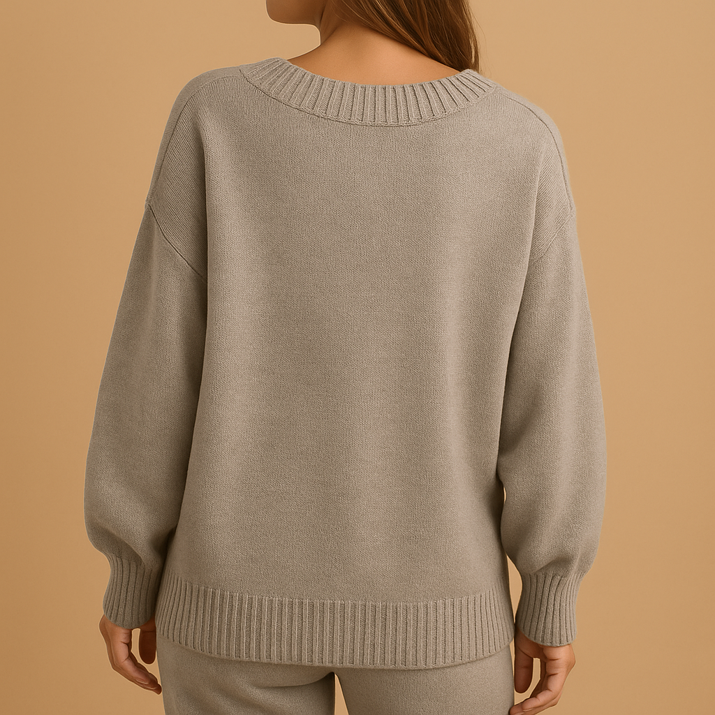 Women's knitted V-neck sweater in soft, breathable fabric. Ideal for casual, office, or layered looks in every season.