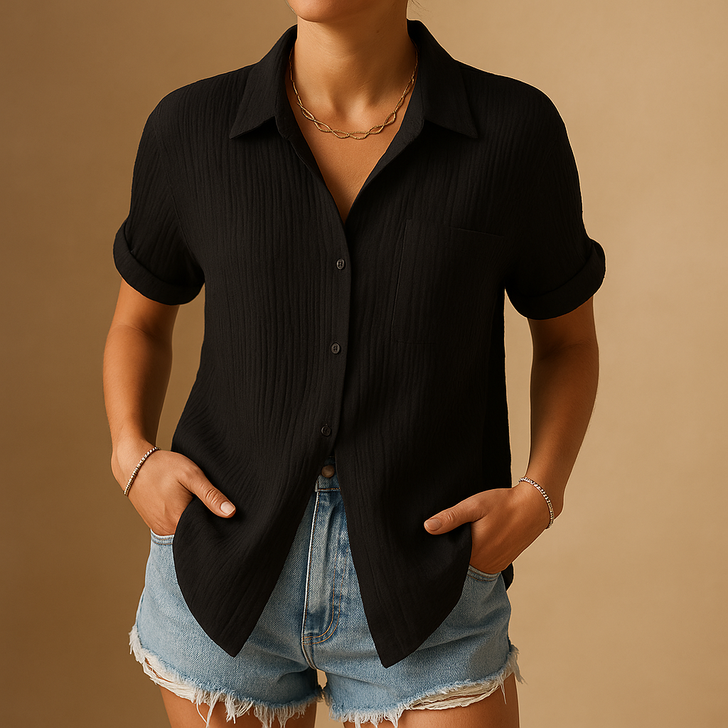 Women’s casual short sleeve polo with relaxed fit, classic collar, and chest pocket, available in stylish shades for summer and everyday wear.