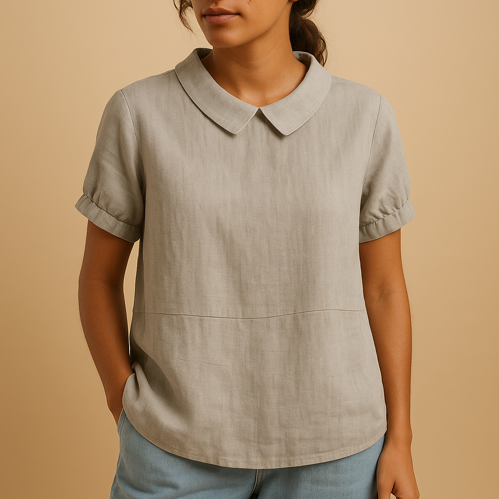 Women’s elegant fitted blouse with a classic design — perfect for office wear, formal meetings, and timeless smart-casual outfits.