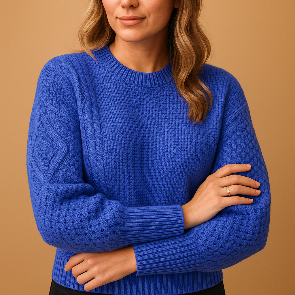 Women’s elegant knit sweater with long sleeves, relaxed feminine cut, soft breathable fabric, perfect for daily wear, office, or evening outfits.