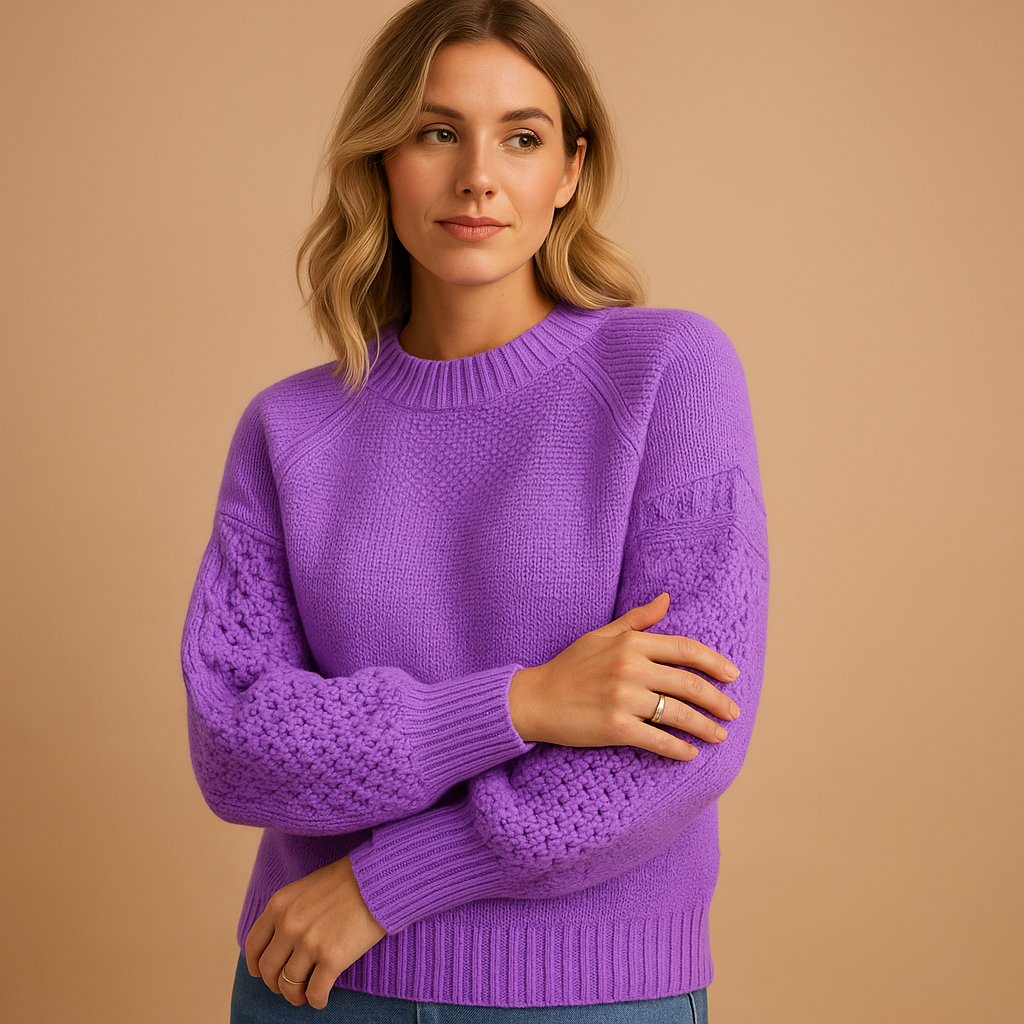 Women’s elegant knit sweater with long sleeves, relaxed feminine cut, soft breathable fabric, perfect for daily wear, office, or evening outfits.