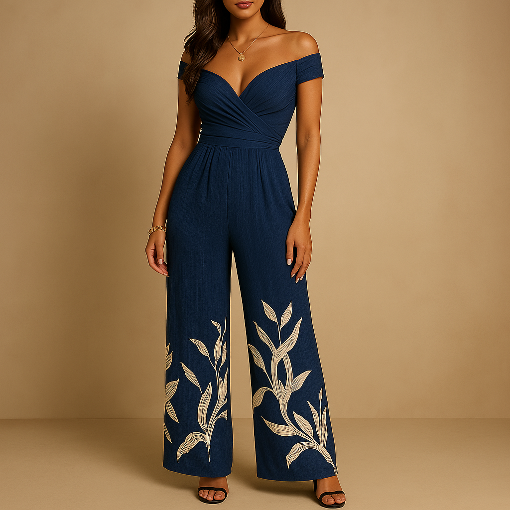 Women’s floral off-shoulder jumpsuit with tailored fit and colorful print. Ideal outfit for weddings, summer parties, and elegant events.