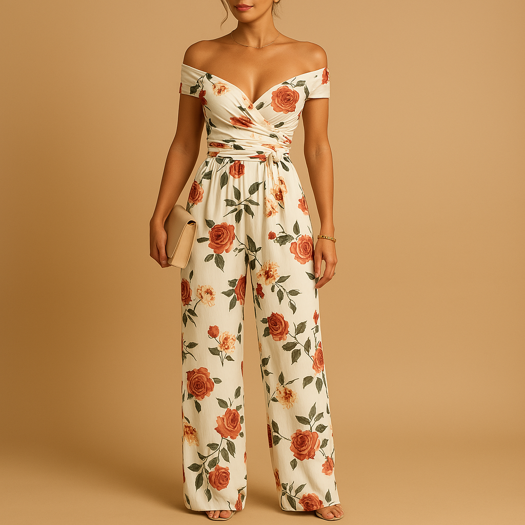 Women’s floral off-shoulder jumpsuit with tailored fit and colorful print. Ideal outfit for weddings, summer parties, and elegant events.
