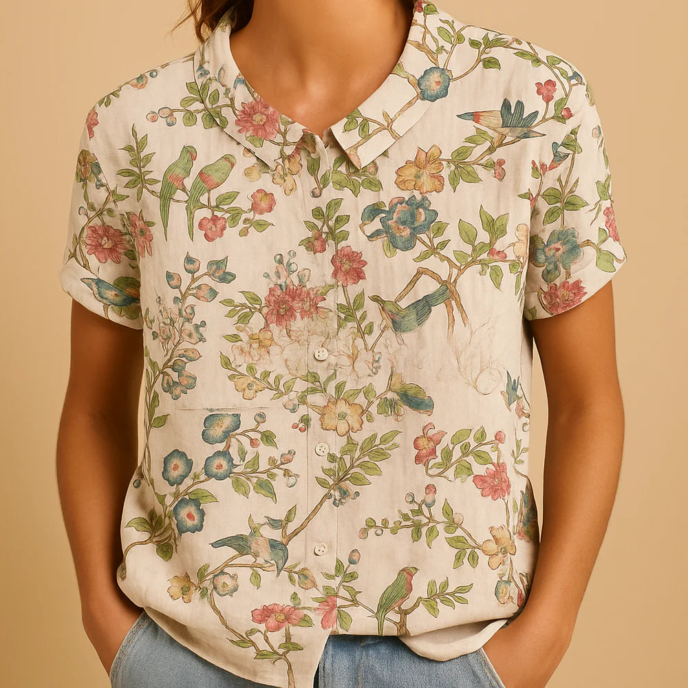 Lightweight floral print blouse for women with loose fit and breathable fabric, ideal for casual days or warm weather.