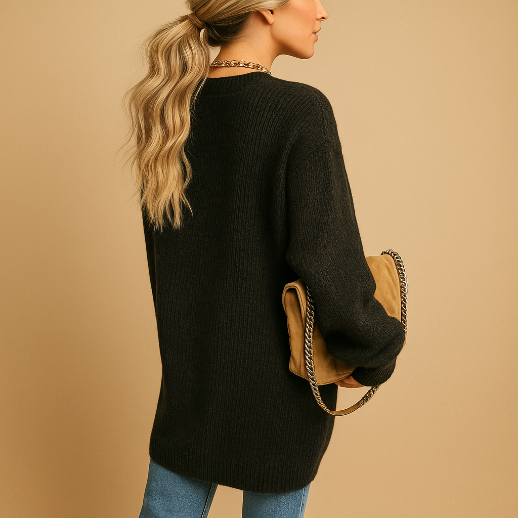 Women’s knitted cardigan with relaxed fit, open front, and breathable fabric, perfect for layering in winter and transitional seasons.