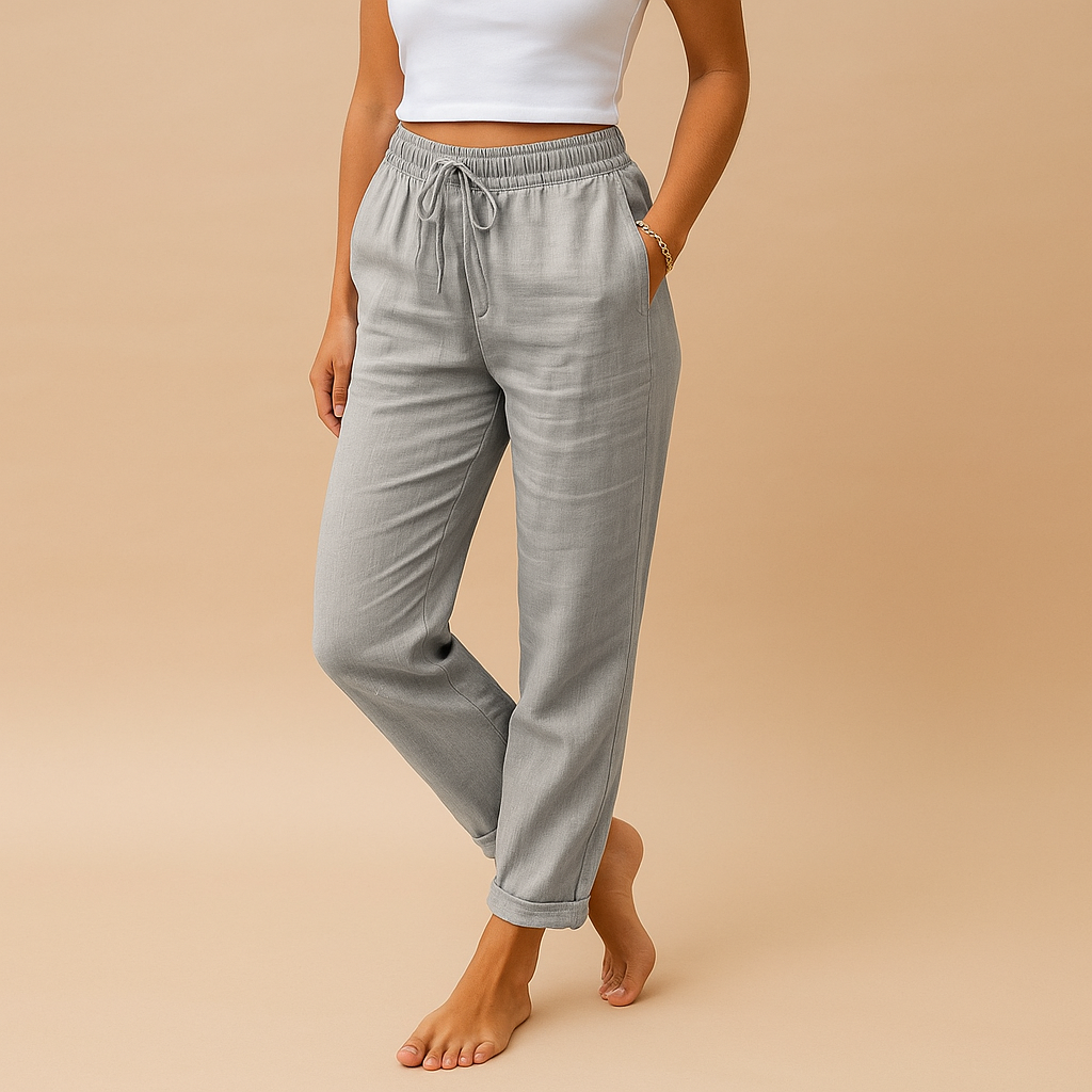 Lightweight pants for women with elastic waistband and flowing fabric, designed with a feminine cut, perfect for casual or formal outfits.