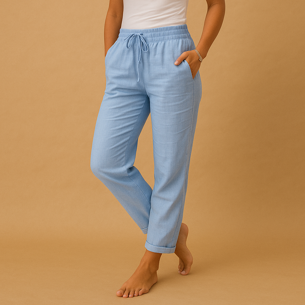 Lightweight pants for women with elastic waistband and flowing fabric, designed with a feminine cut, perfect for casual or formal outfits.