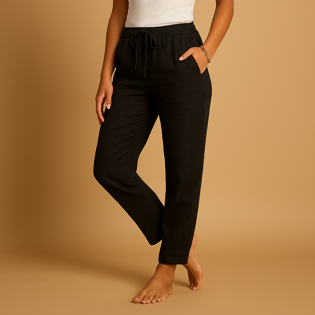 Lightweight pants for women with elastic waistband and flowing fabric, designed with a feminine cut, perfect for casual or formal outfits.