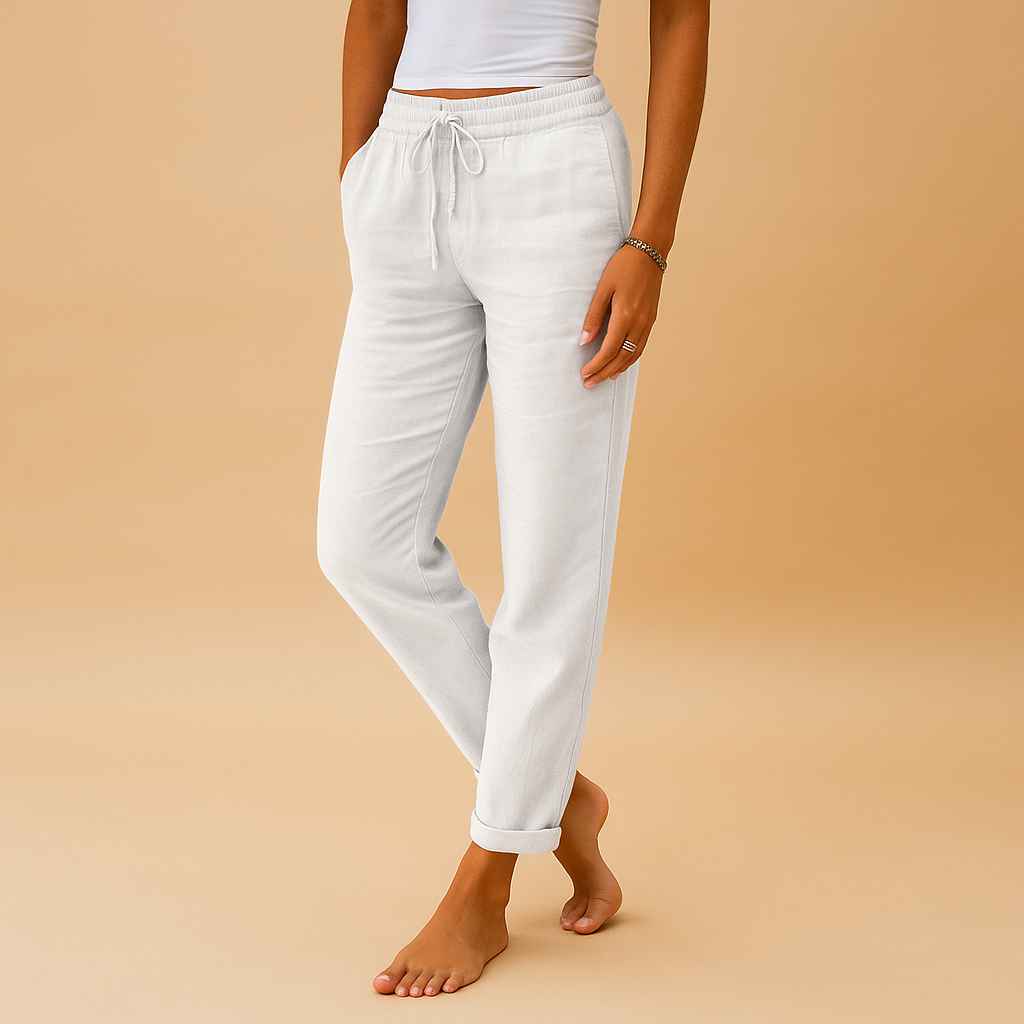 Lightweight pants for women with elastic waistband and flowing fabric, designed with a feminine cut, perfect for casual or formal outfits.