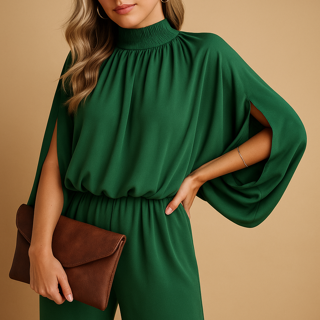 Women’s long sleeve wide leg jumpsuit in green with a relaxed fit and cinched waist. Perfect for elegant daywear, dinners, and formal occasions.