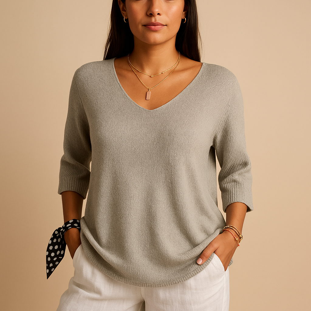 Elegant loose fit luxury top for women in soft neutral tones, perfect for daily wear or casual occasions.