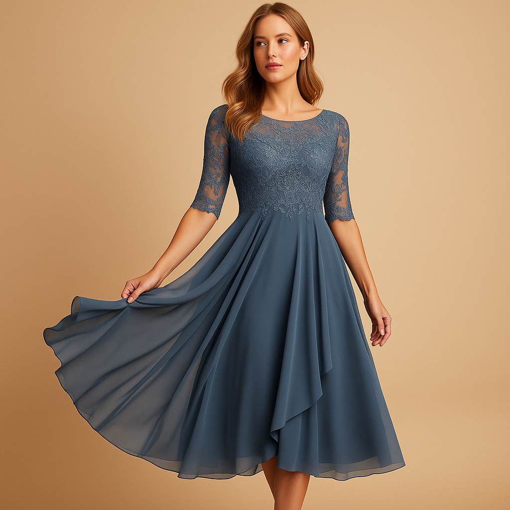 Women’s midi dress with lace top, elbow-length sleeves, and asymmetrical layered skirt. Perfect for cocktail parties and special summer occasions.