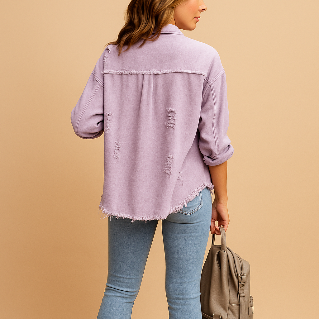 Women’s oversized denim jacket with vintage distressed details and relaxed fit. Perfect for casual outfits and trendy streetwear looks.
