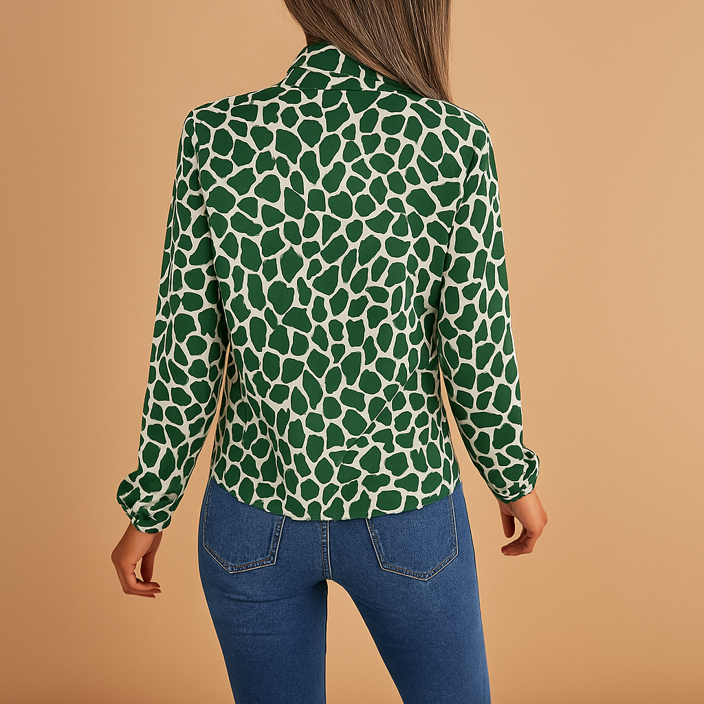 Women’s green polka dot blouse with bow tie and elastic cuffs — elegant, comfortable, and perfect for work or casual outfits.