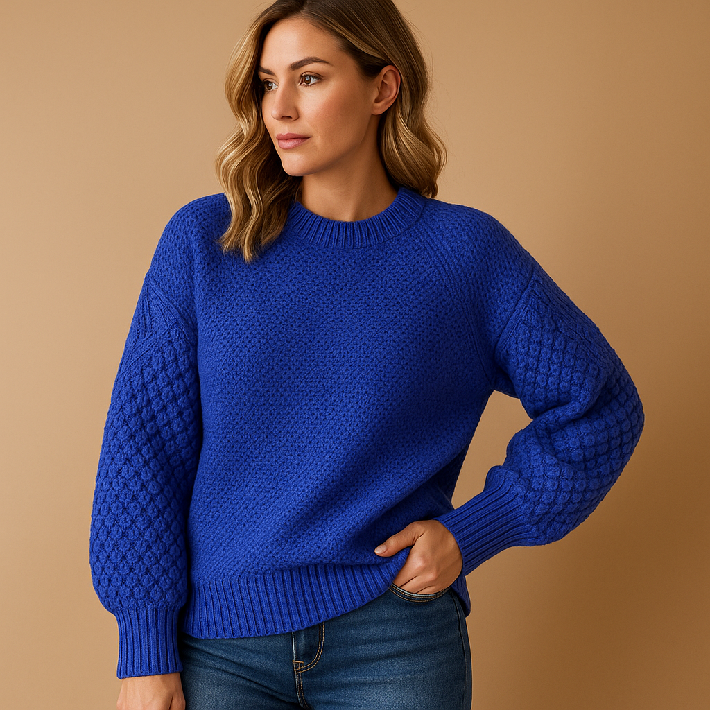 Women’s soft knitted sweater with relaxed tailored fit and lightweight insulating fabric, ideal for work, weekends, or elegant winter outfits.