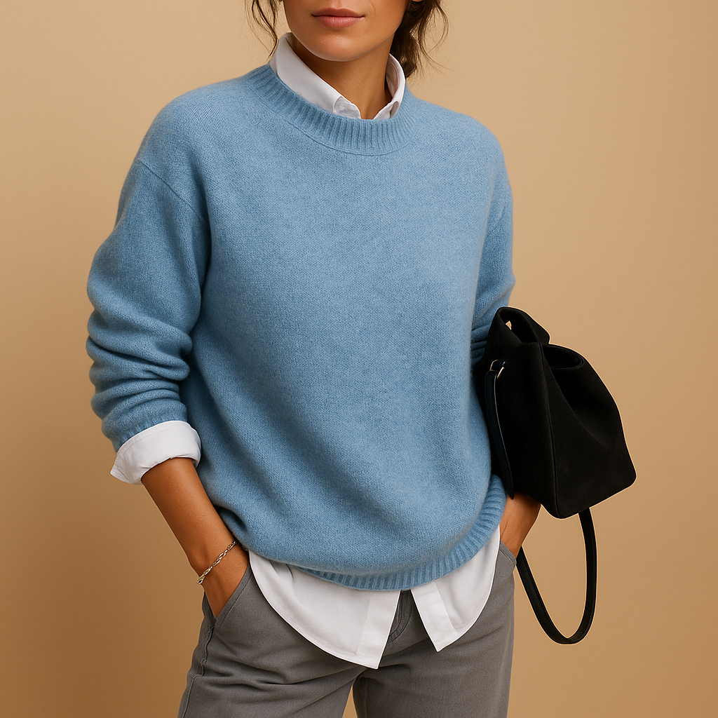 Women’s stylish wool knit sweater with refined minimalist design, elegant fit, and soft fabric. Perfect for casual days or semi-formal office looks.