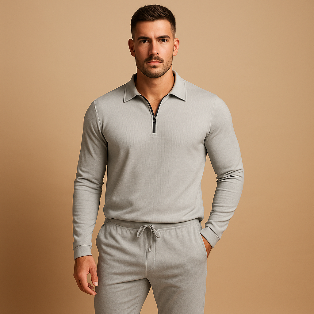 Modern tracksuit for men with zipped polo top and tapered joggers. Slim fit with stretch, perfect for casual outings, city walks, or relaxing at home.